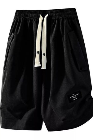 Black relaxed fit chino shorts with drawstring and pockets.