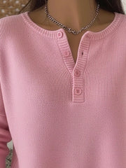 Pink long-sleeve knit top with button detail and crew neck