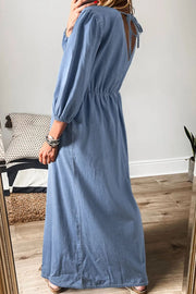 Light denim maxi dress with plunge back and tie detail, elastic waist, long sleeves