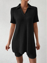 Black ribbed polo shirt and shorts set with a v-neck and collar detail.