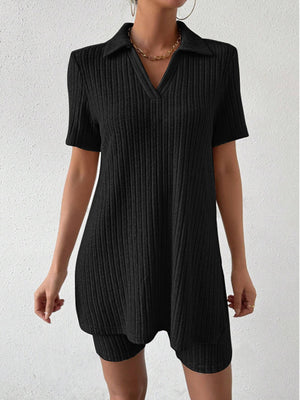 Black ribbed polo shirt and shorts set with a v-neck and collar detail.