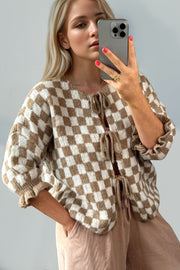 Checkered tie-front knit cardigan with ruffle sleeves in taupe and white