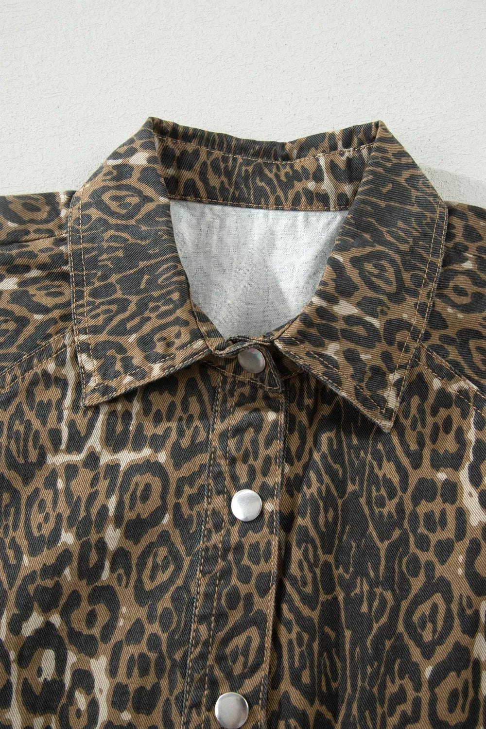 Leopard print denim dress with collar and silver snap buttons