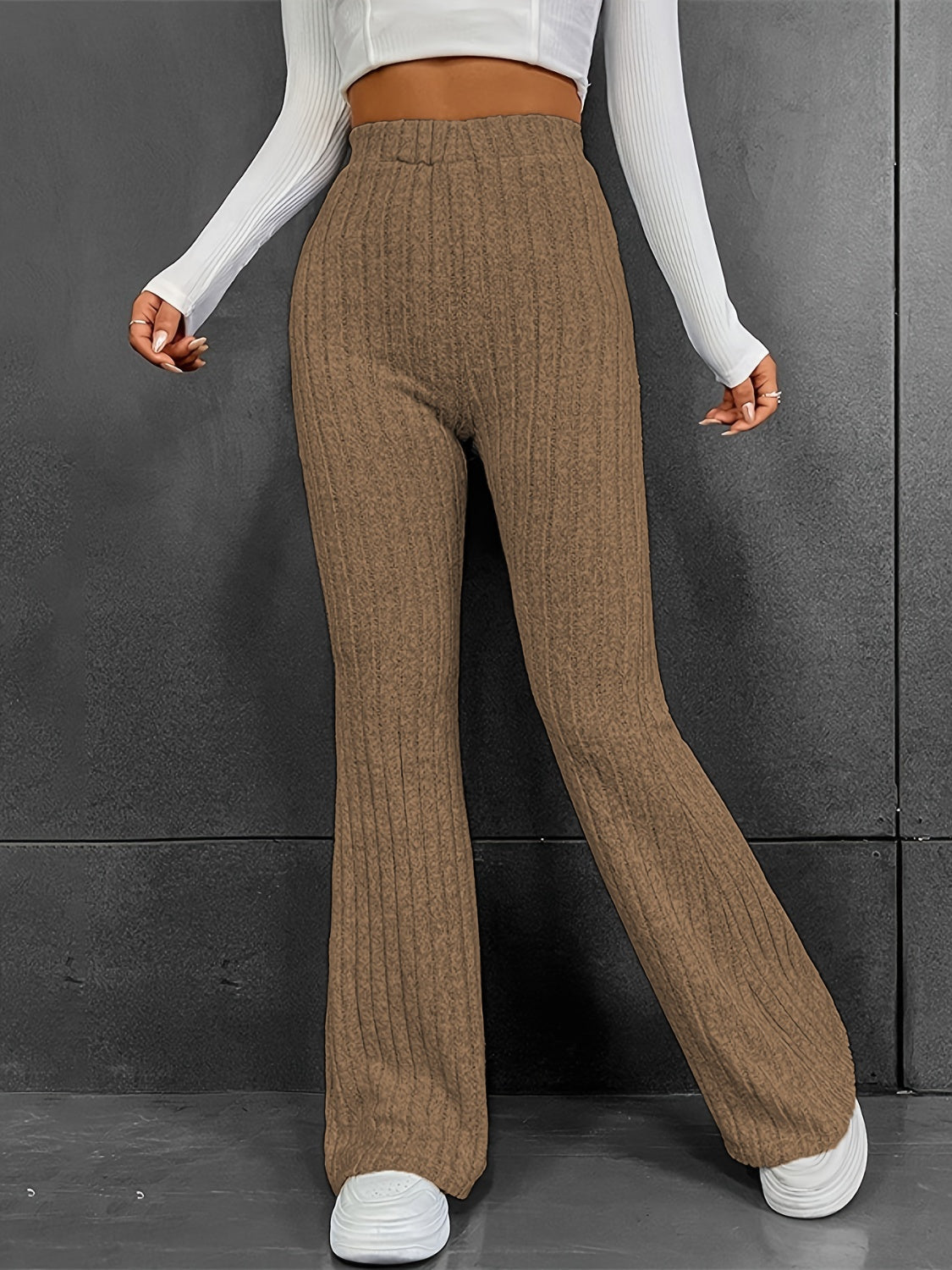 Mocha ribbed flare trousers in 100% polyester with a high waist.