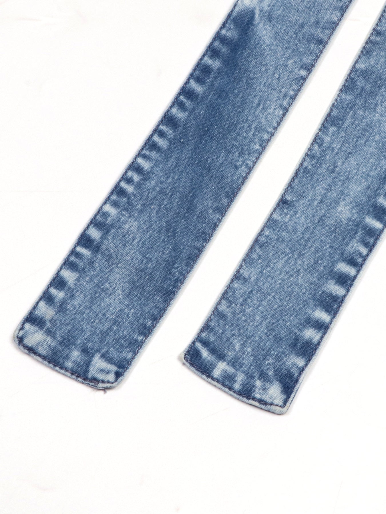 Denim halter neck dress straps with button front detail in acid wash blue cotton blend.