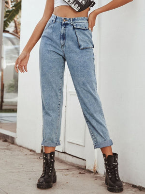 Light wash barrel leg jeans with unique pocket detail and cuffed hems.