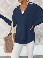 Navy ribbed knit pullover with funnel neck and quarter zip, long sleeves, relaxed fit.