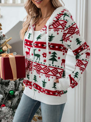 White fleece zip-up hoodie with festive red and green Fair Isle pattern, featuring reindeer and trees.
