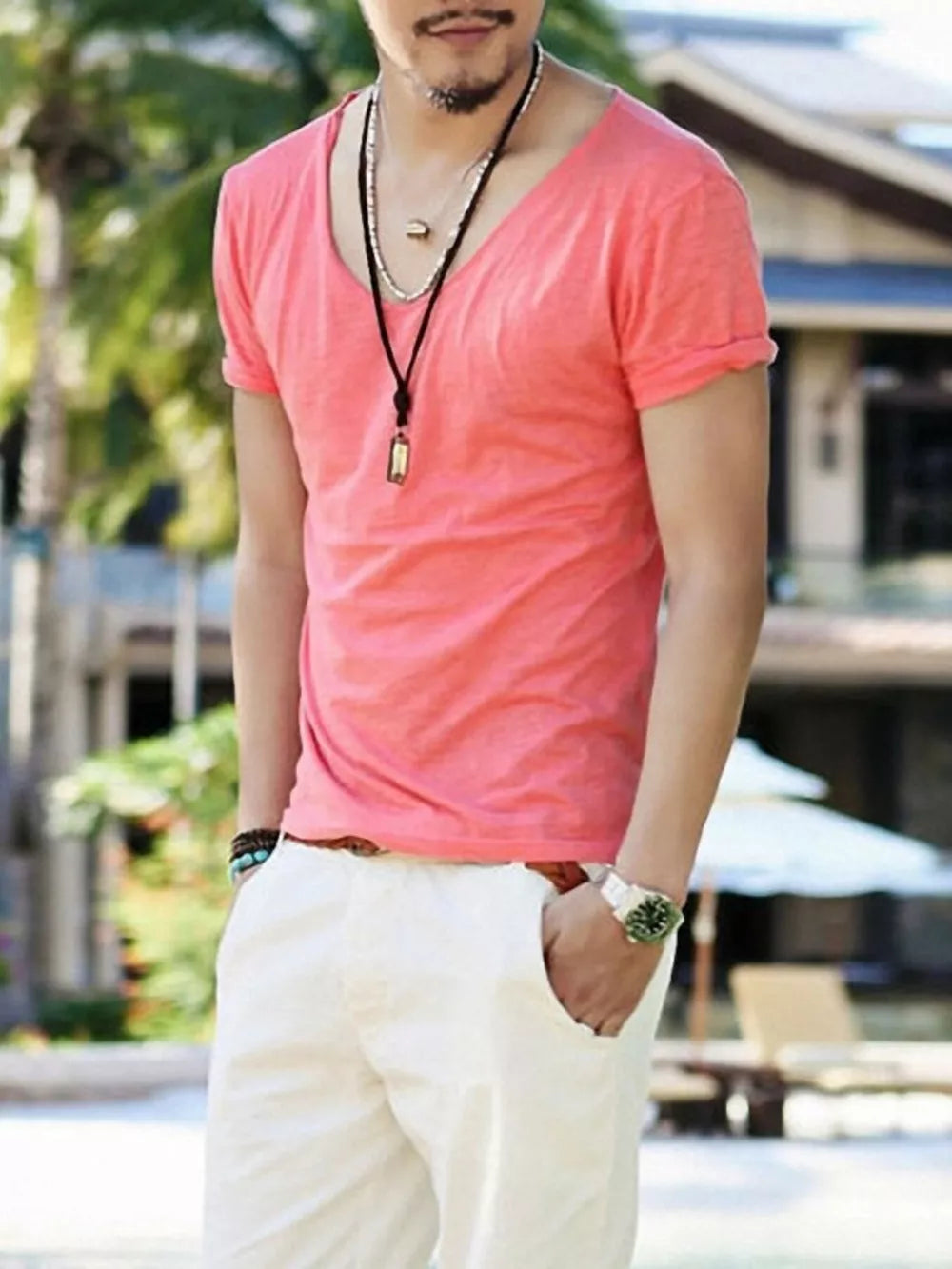 Men's relaxed fit cotton tee in watermelon red with a deep scoop neck and cuffed short sleeves.