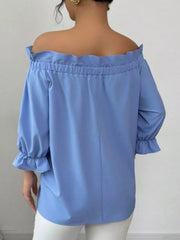 Sky blue ruffled off-the-shoulder blouse with bow detail on 3/4 sleeves.