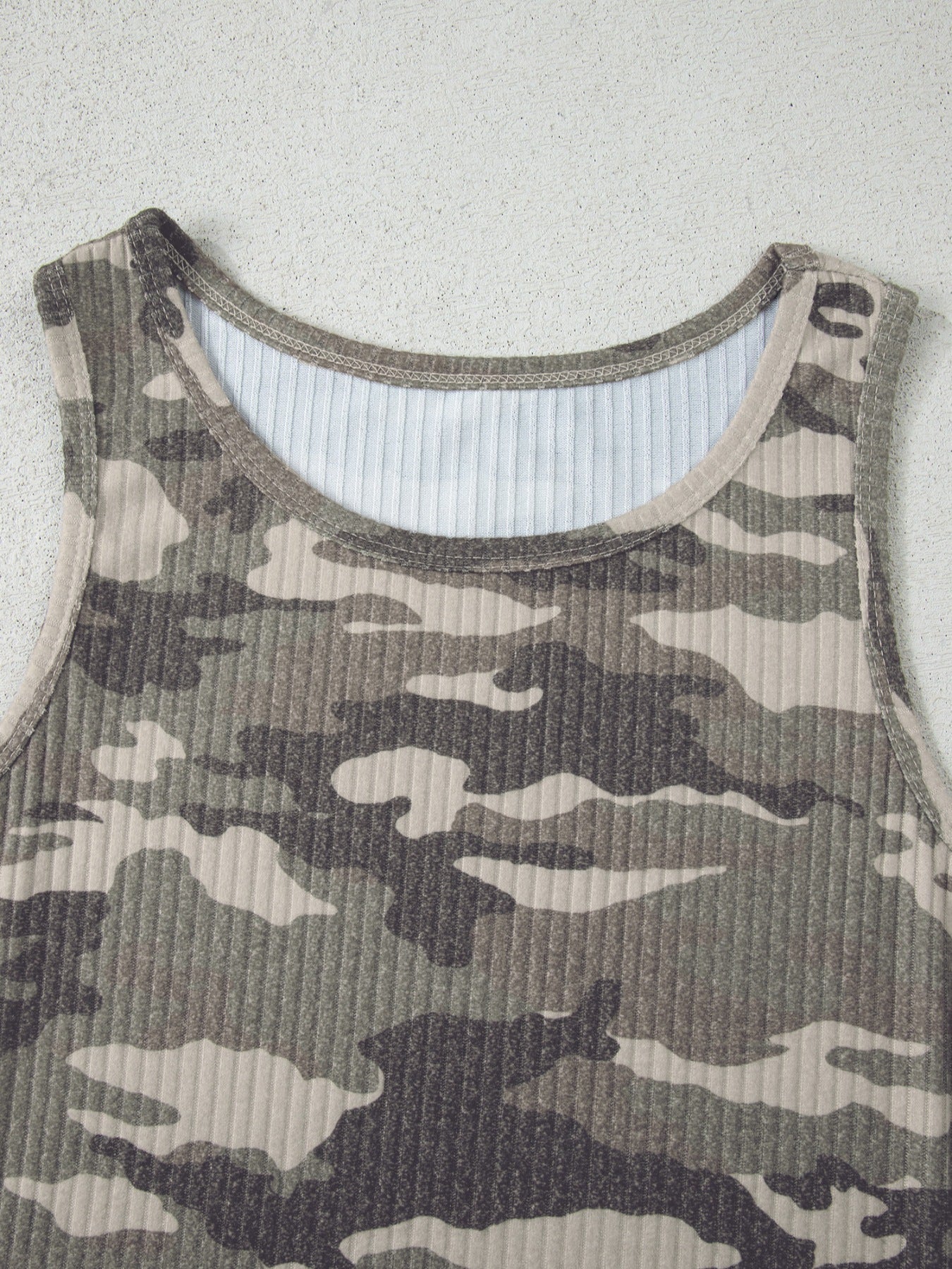 Ribbed knit camouflage tank top in army green with a scoop neckline.