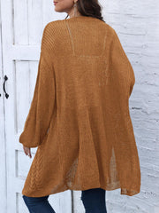 Caramel cable knit cocoon cardigan with open knit detail and braided hem.