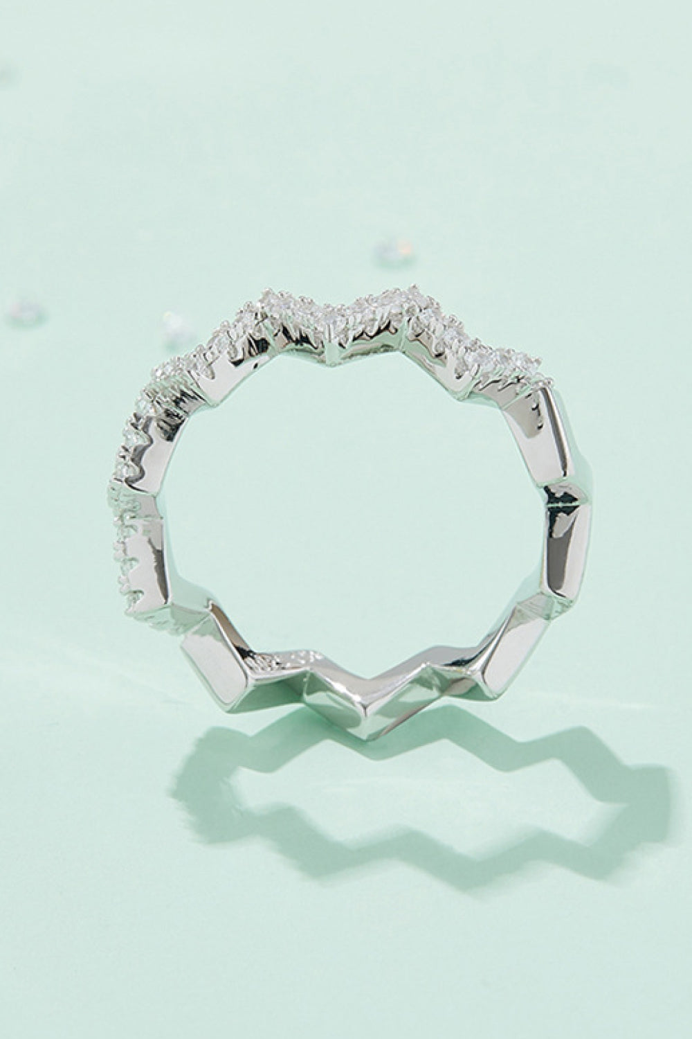 Silver zigzag pavé moissanite band ring with geometric details