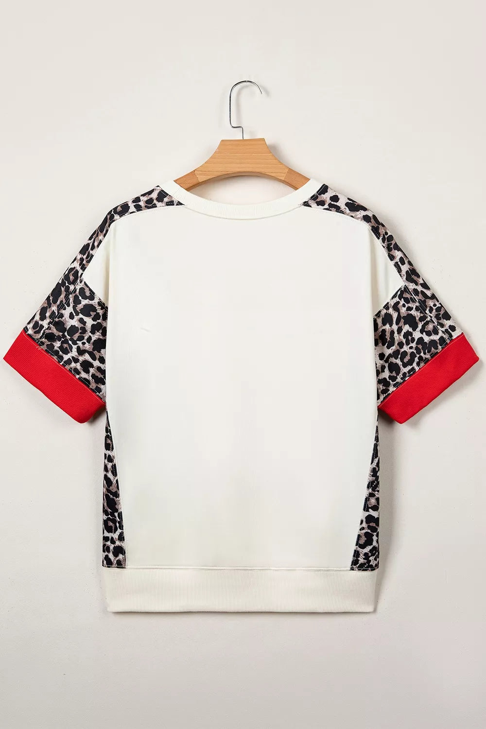 Leopard Patchwork Uneven Hem Short Sleeve Top, close-up detail