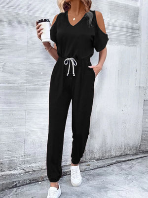 Black cold-shoulder jumpsuit with drawstring waist and v-neckline