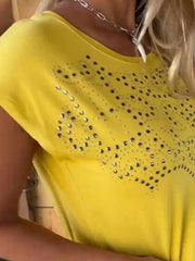 Yellow studded perforated tee with short sleeves and a round neckline.