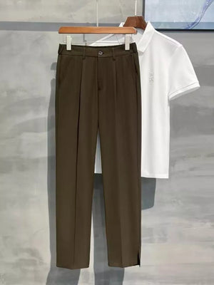 Brown men's joggers with elevated seam detail and side slit hem.