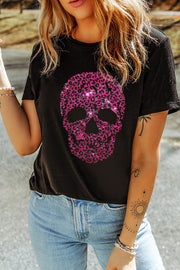 Black t-shirt with a pink leopard print skull graphic and sparkle details.