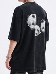 Black relaxed fit graphic t-shirt with crew neck and short sleeves.