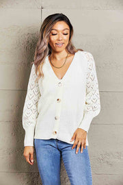 White diamond knit button-down cardigan with V-neck and balloon sleeves