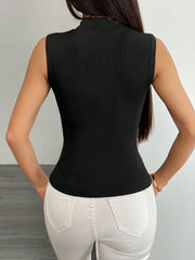 Black ribbed mock neck sleeveless top with floral appliqué detail