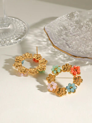 Gold floral halo beaded statement earrings with colorful crystal accents