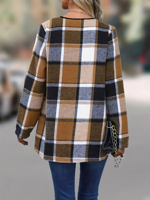 Asymmetric plaid drape front jacket in caramel, black, white, and brown plaid.