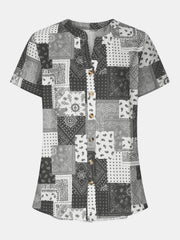 Gray bandana patchwork henley blouse with button front and short sleeves.