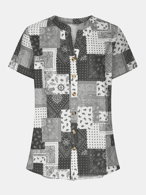 Gray bandana patchwork henley blouse with button front and short sleeves.