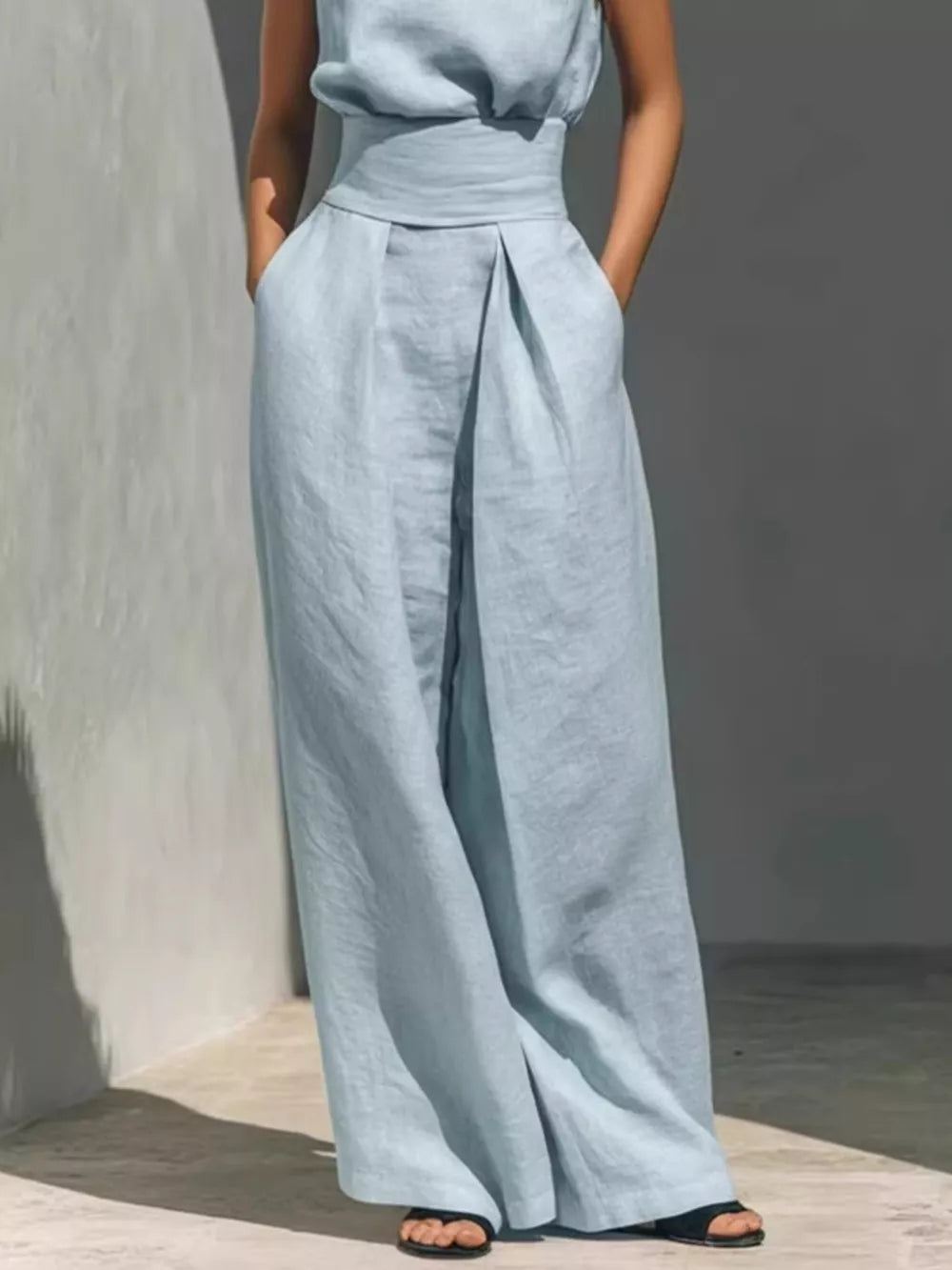 Sleeveless Wide-leg Jumpsuit With Smocked Waist in Apricot, fabric detail