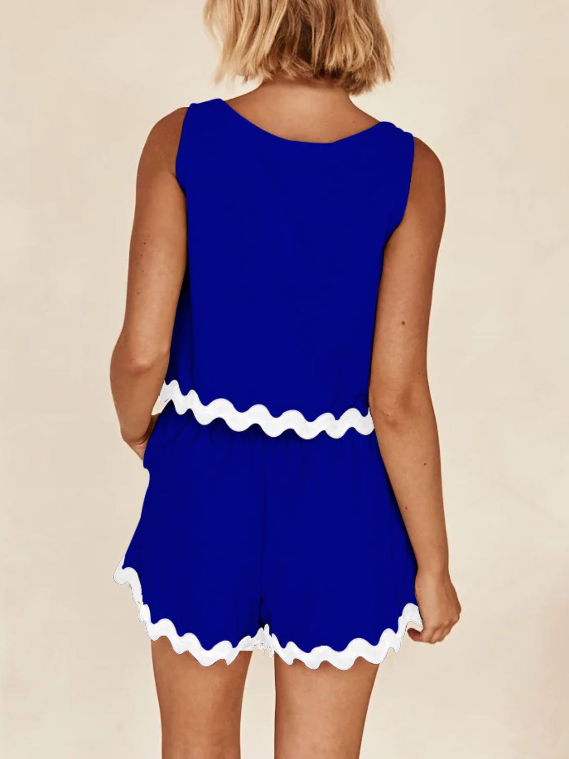 Royal blue scalloped edge tank and short co-ord set with white trim.