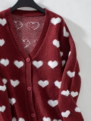 Burgundy jacquard knit cardigan with white hearts, V-neck, button front, acrylic.