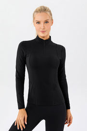 Black athleisure zip-neck long sleeve top with seam details