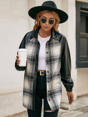 Plaid & faux leather raglan shacket with buttoned front and black sleeves.
