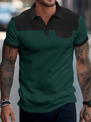 Colorblock waffle knit polo shirt in dark green and black with a chest pocket.