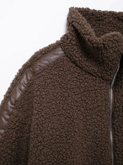 Dark brown teddy fleece zip-up jacket with faux leather contrast piping detail.