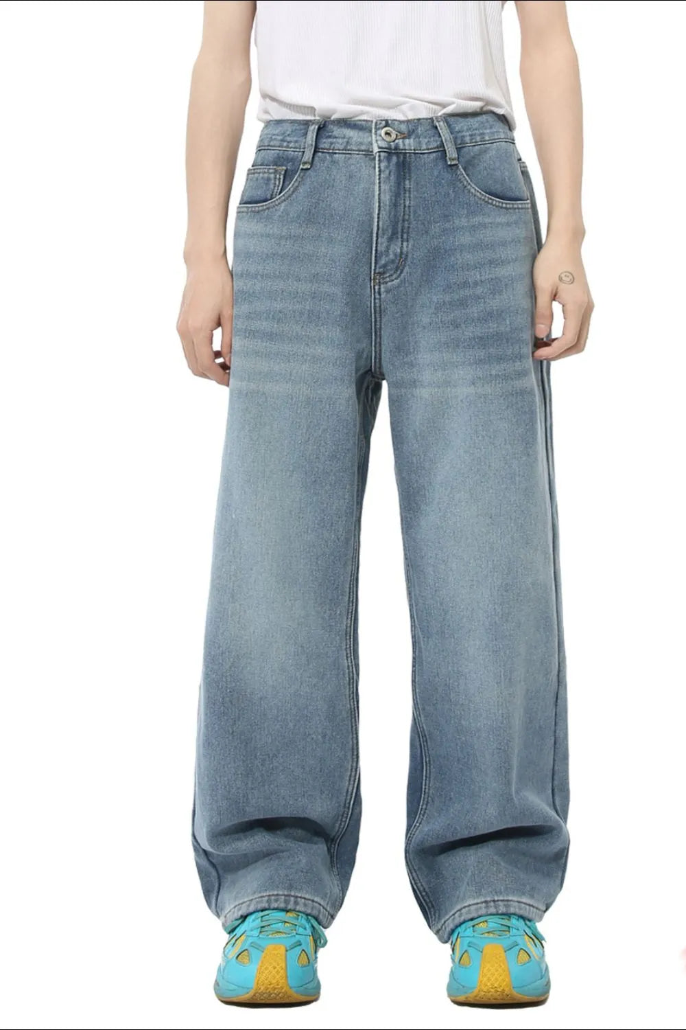 Light blue denim jeans with a relaxed, wide-leg fit and baggy cut.