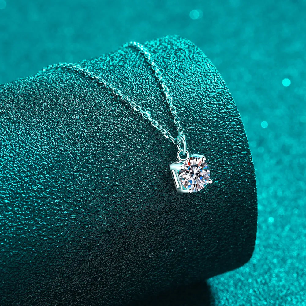 Silver solitaire moissanite pendant necklace on a delicate chain, 925 sterling silver.