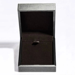 Celestial Blue Moissanite Knot Ring gift box, open, with dark velvet lining.