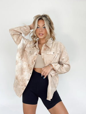 Cloud Wash Overshirt in beige with patch pockets and button front, styled casually.