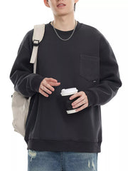 Dark gray sweatshirt with textured pocket and crew neck, casual men's style