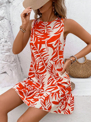 Tropical leaf print mini dress with ruffle hem and sleeveless design.
