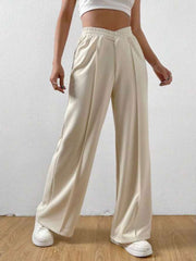 Cream V-waistline palazzo sweatpants with center seams and wide leg