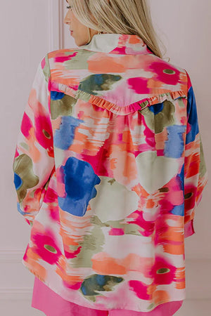 Painterly abstract print blouse in pink with ruffle detail on the back yoke.