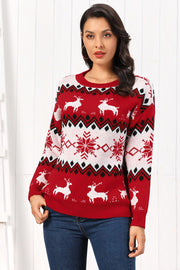 Red acrylic sweater with reindeer and snowflake Fair Isle pattern, crew neck, long sleeves.