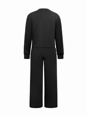 Black long sleeve top and wide leg pants pajama set for women.