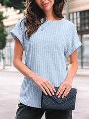Light blue ribbed knit t-shirt with cuffed short sleeves and a round neckline.