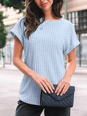 Light blue ribbed knit t-shirt with cuffed short sleeves and a round neckline.