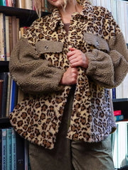 Plush leopard print fleece jacket with button-down front and two chest pockets.