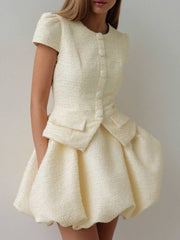 Textured cream button-down dress with short sleeves and bubble hem skirt